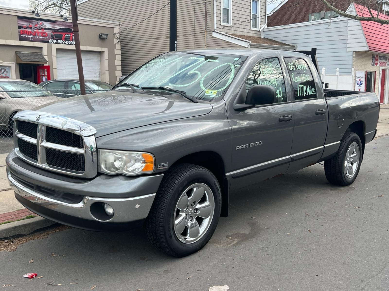 2005 GRAY /BLACK CLOTH Dodge Ram 1500 Laramie Quad Cab Long Bed 4WD (1D7HU18D35S) with an 5.7L V8 OHV 16V engine, 5-Speed Automatic Overdrive transmission, located at 1018 Brunswick Ave, Trenton, NJ, 08638, (609) 989-0900, 40.240086, -74.748085 - Here is an awesome running work truck! Great shape and plenty of service history! Crew Cab w Hemi V-8 motor!! A must see and drive ASAP, call Anthony 609-273-5100 - Photo #1